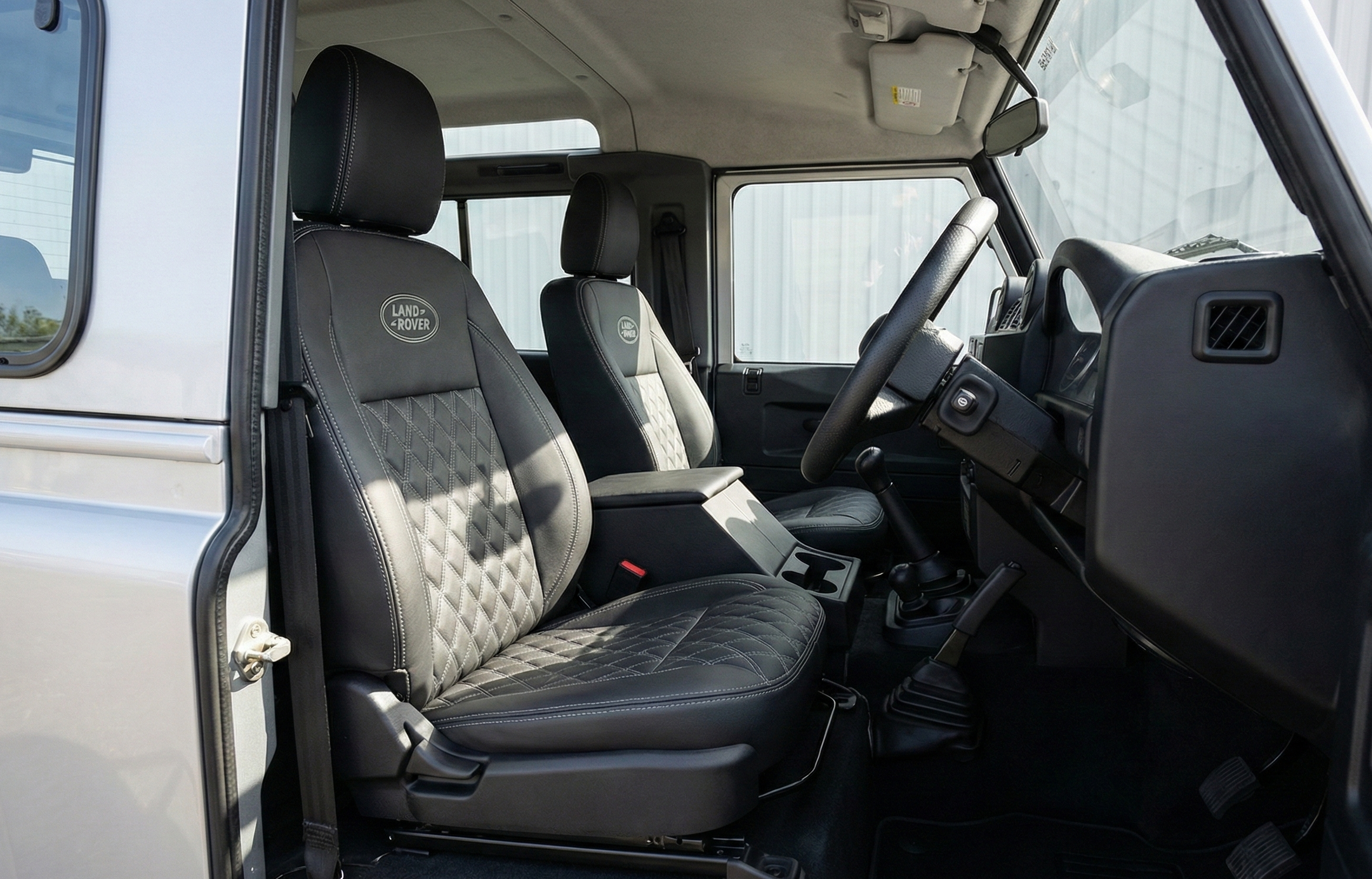 Land Rover Defender seat fitted view upholstery Blue Note Upholstery